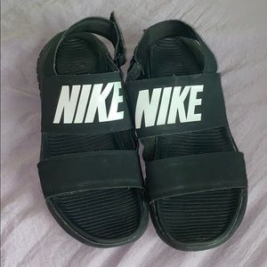 Black Nike strap sandals